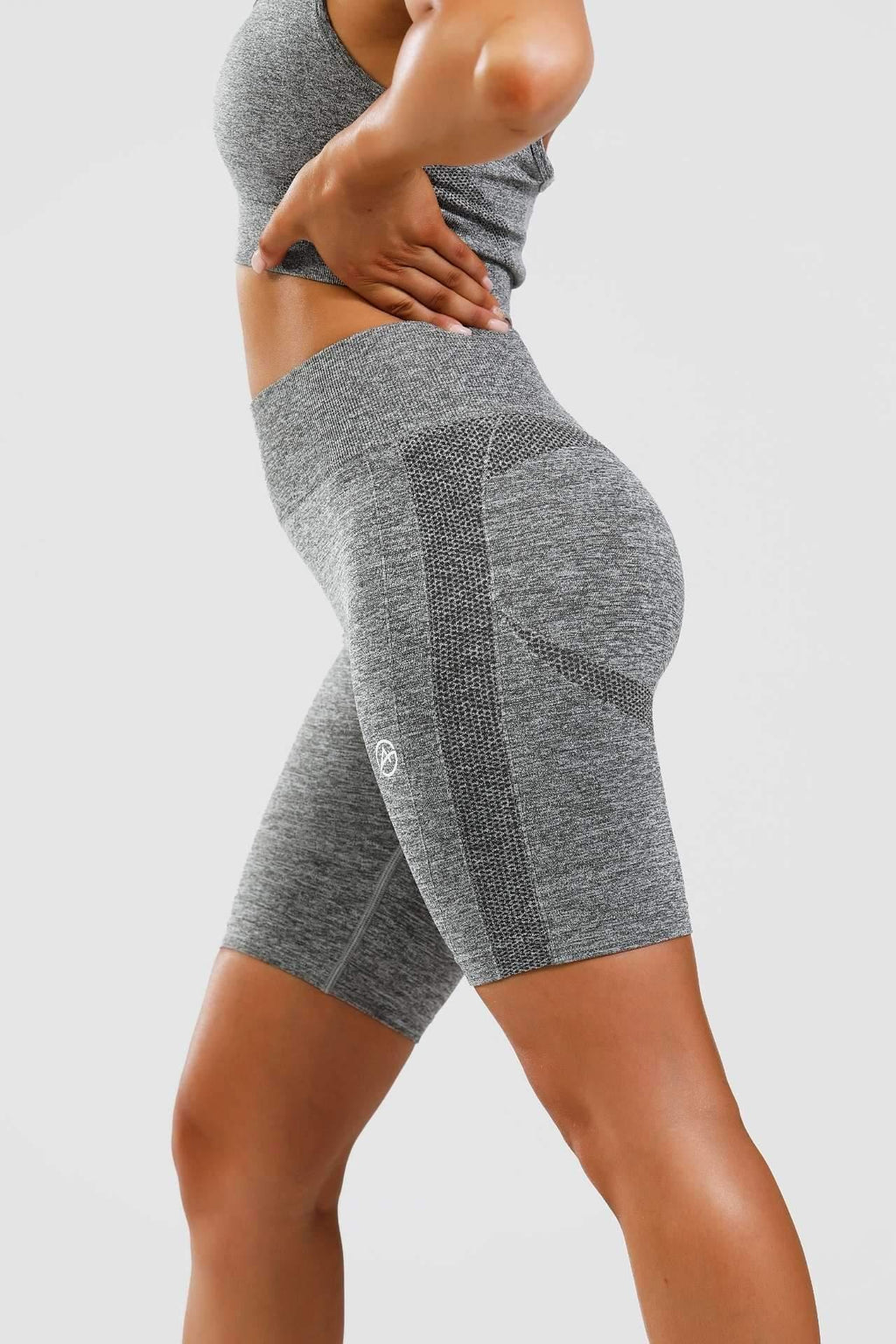Close up side shot of girl wearing grey calyspo seamless set