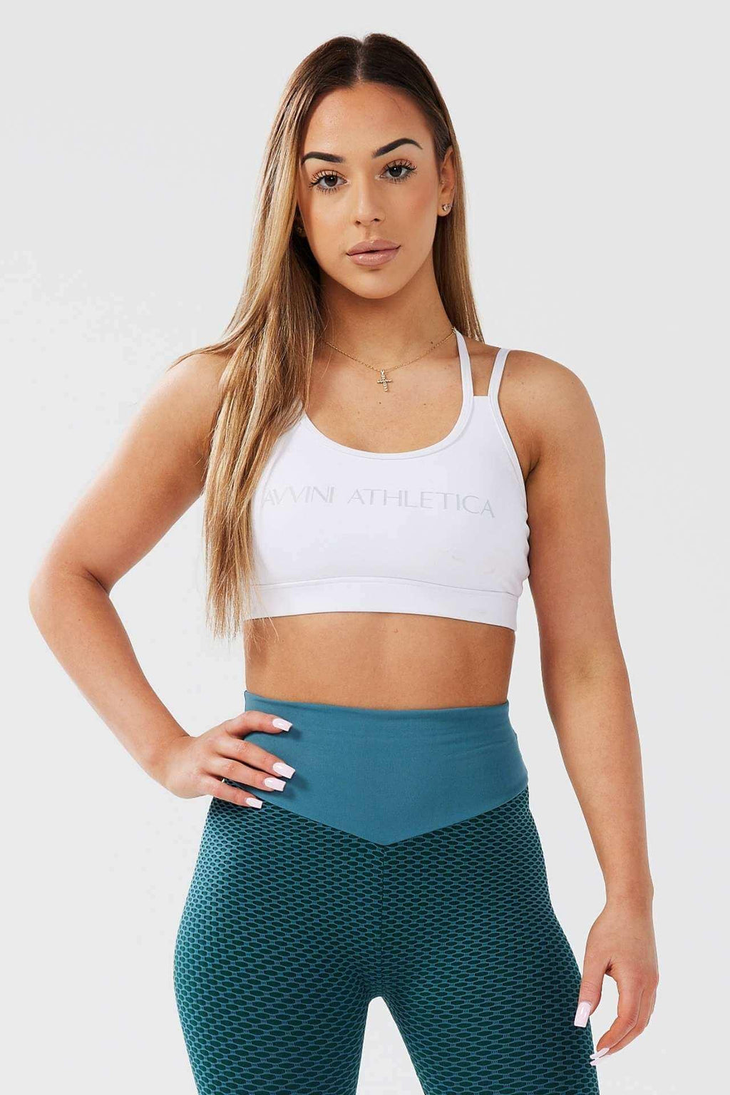 Girl posing hand on hip wearing white classic crop top