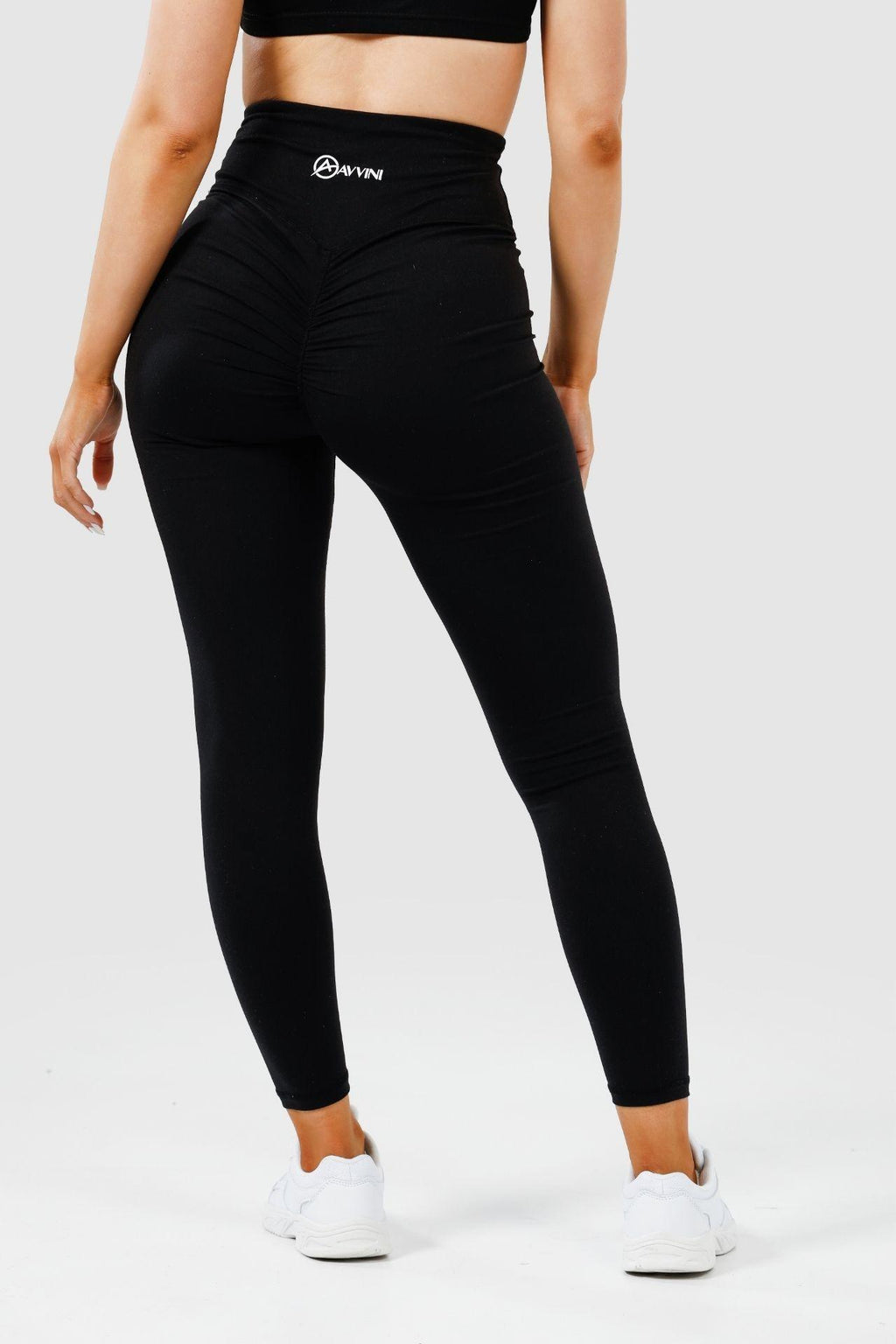 Close up back shot girl wearing black intrigue scrunch bum leggings