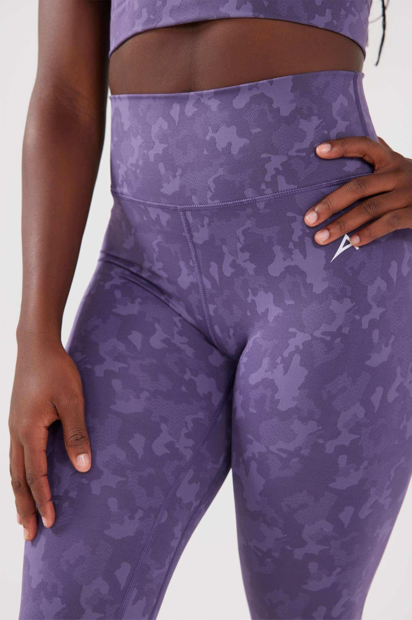 Close up girl posing hand on hip wearing legacy scrunch bum leggings in purple