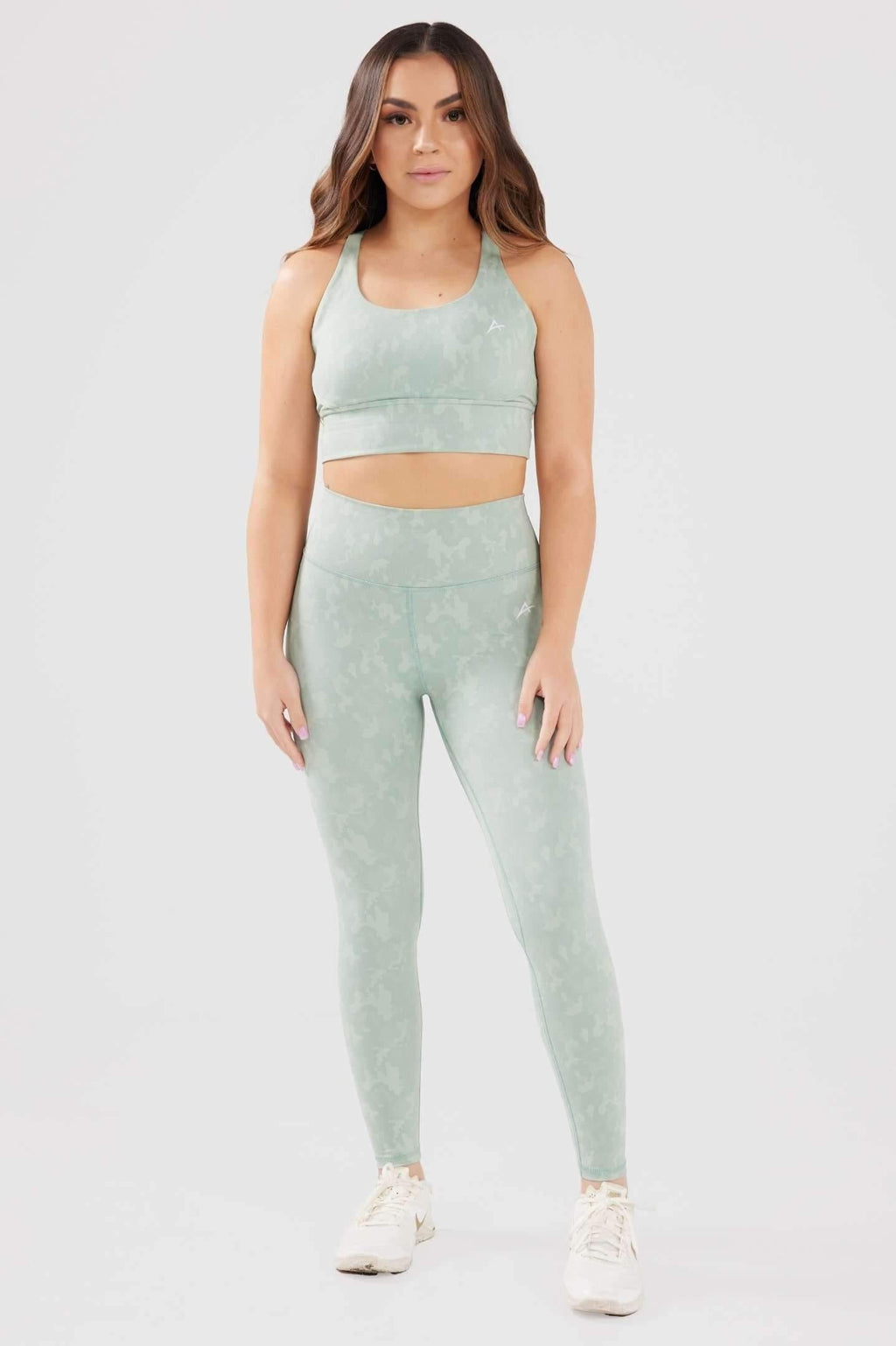 Girl wearing mint legacy scrunch bum set front