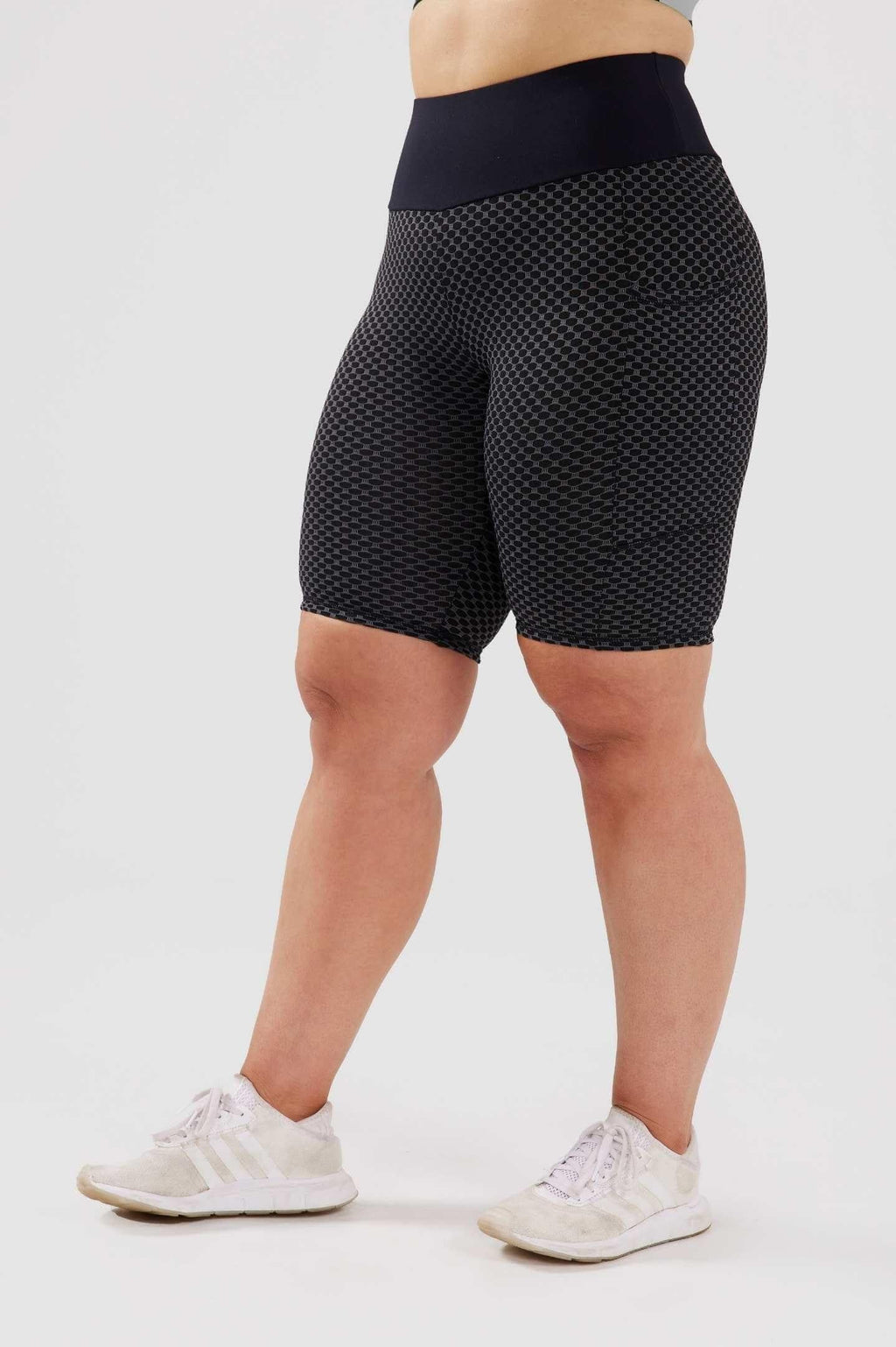 girl wearing black luna bike shorts 