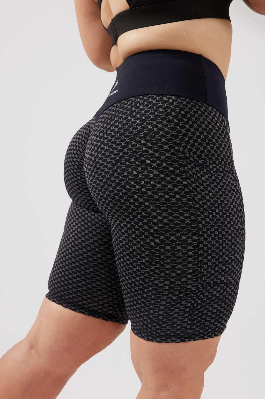 Girl wearing luna black bike short side
