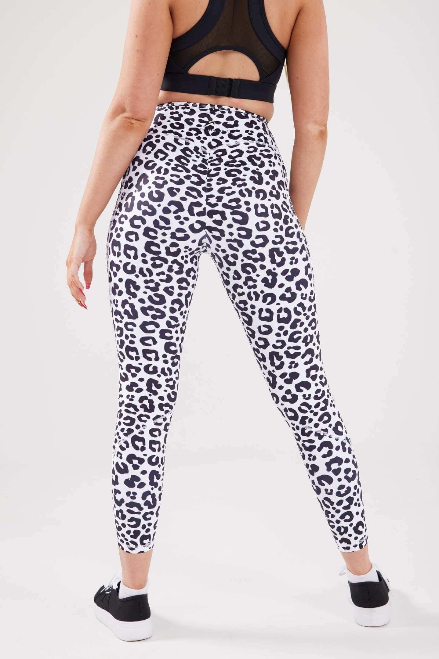 girl wearing luxe scrunch bum pocket leggings in leopard back