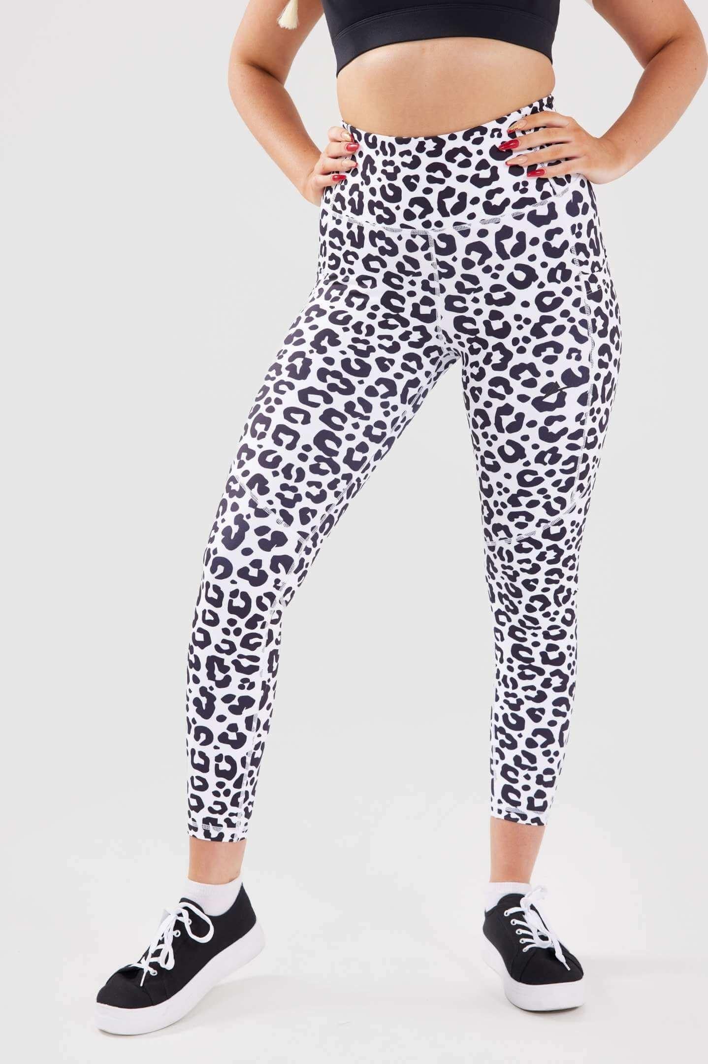 close up girl hands on hips wearing luxe scrunch bum pocket leggings front